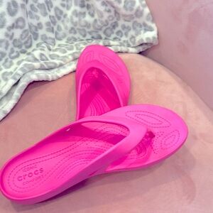 Croc flip flops.  Size 9 women